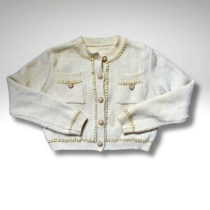 Classic Ivory Knit Cardigan with Gold Chain Detail and Pearl Buttons